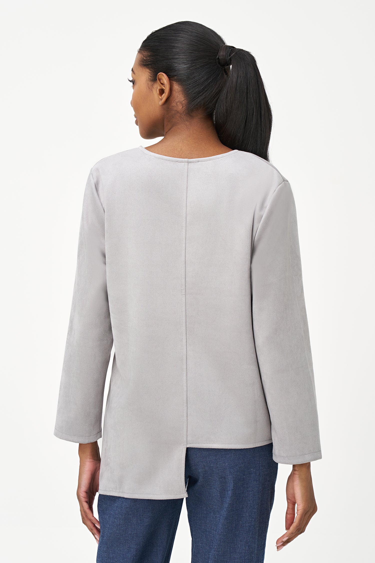 Grey faux suede long sleeve top with asymmetrical hem and front seam detailing.