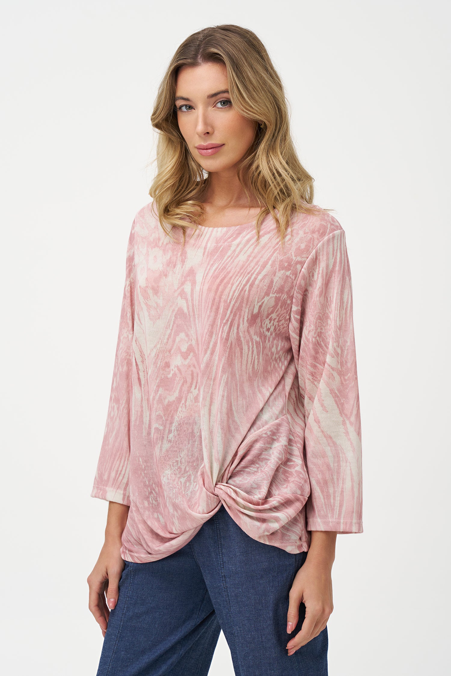 Vanilla and white abstract print top with long sleeves and gathered twist detail at hem