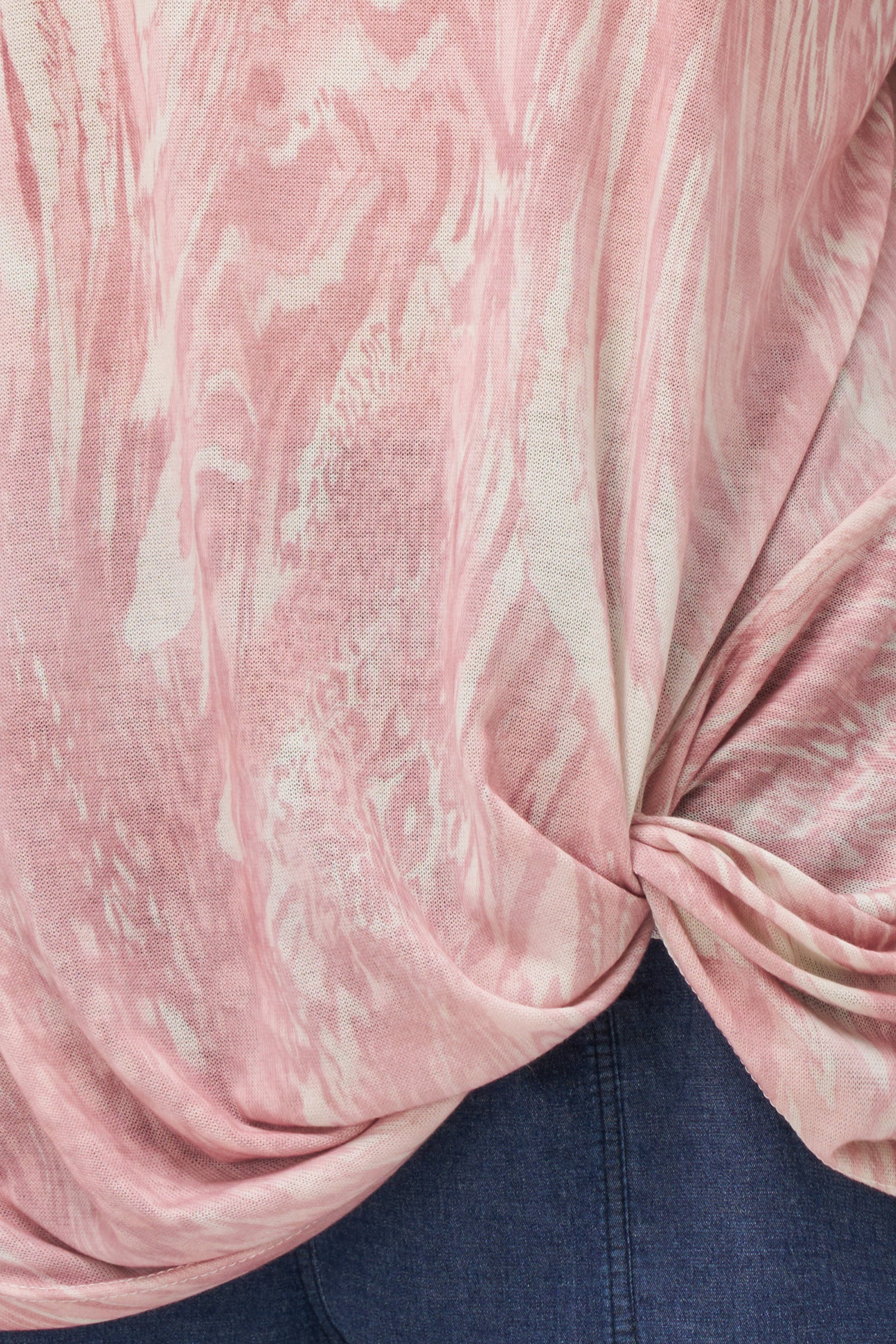 Vanilla and white abstract print top with long sleeves and gathered twist detail at hem