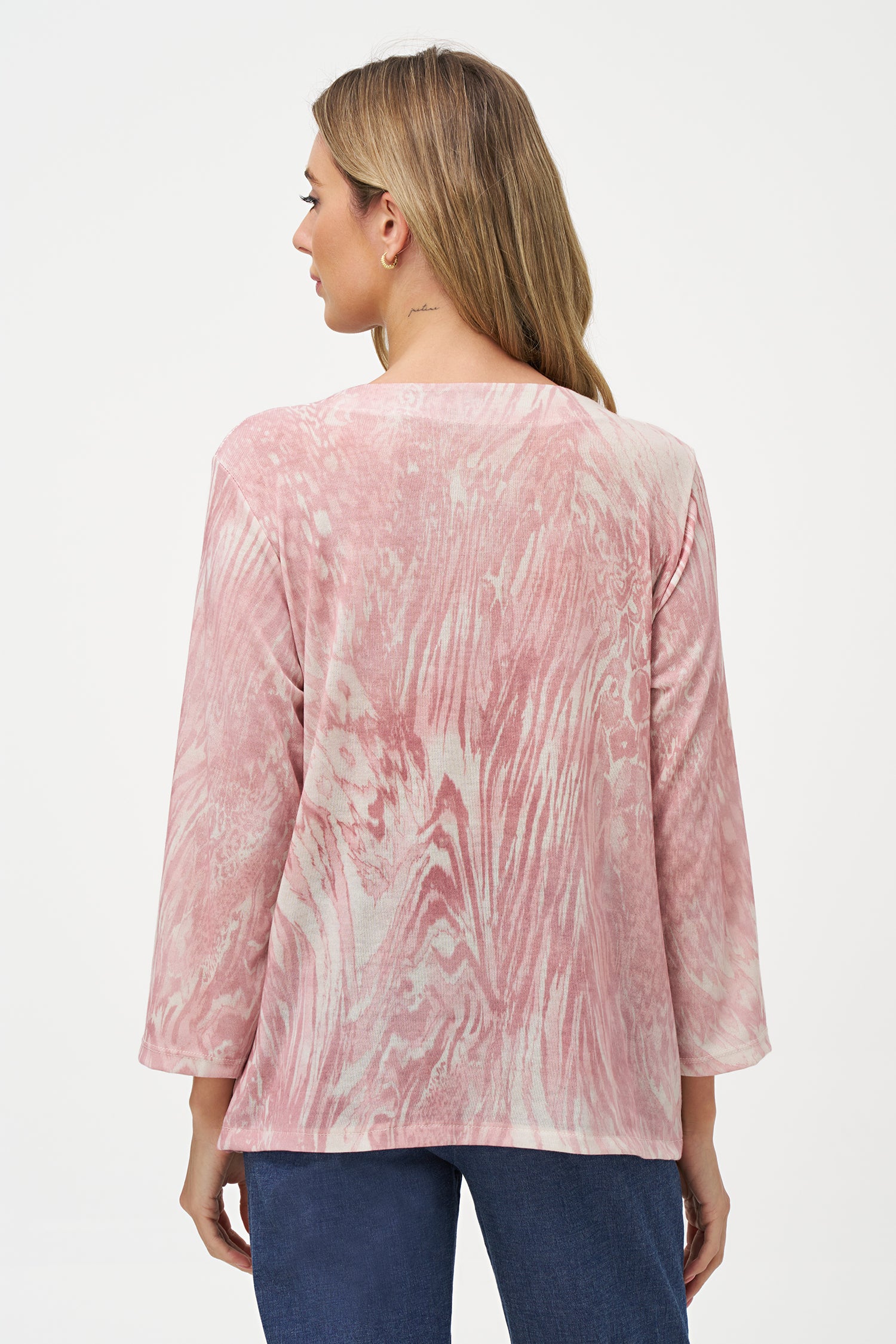 Vanilla and white abstract print top with long sleeves and gathered twist detail at hem
