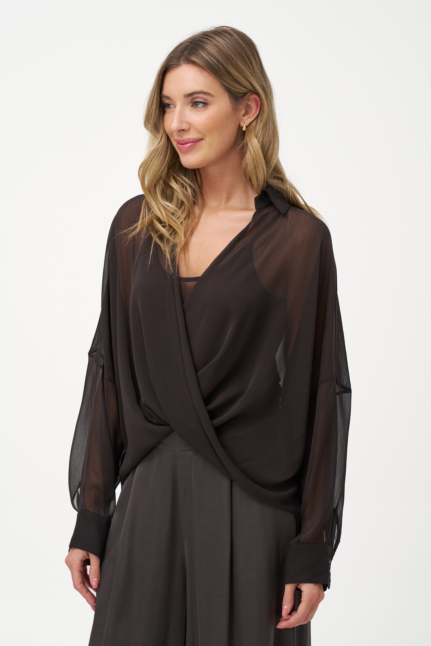 Brown sheer long-sleeve blouse with draped crossover front and inner tank layer