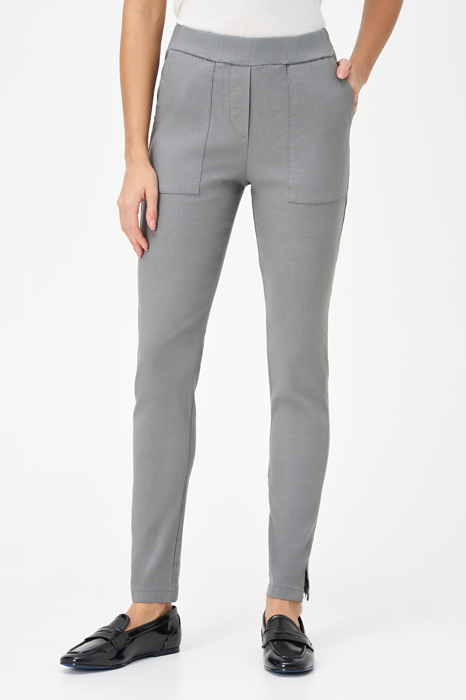 Slim-fit gray pants with wide front pockets, ankle-length cut, and soft stretch viscose blend for modern comfort.