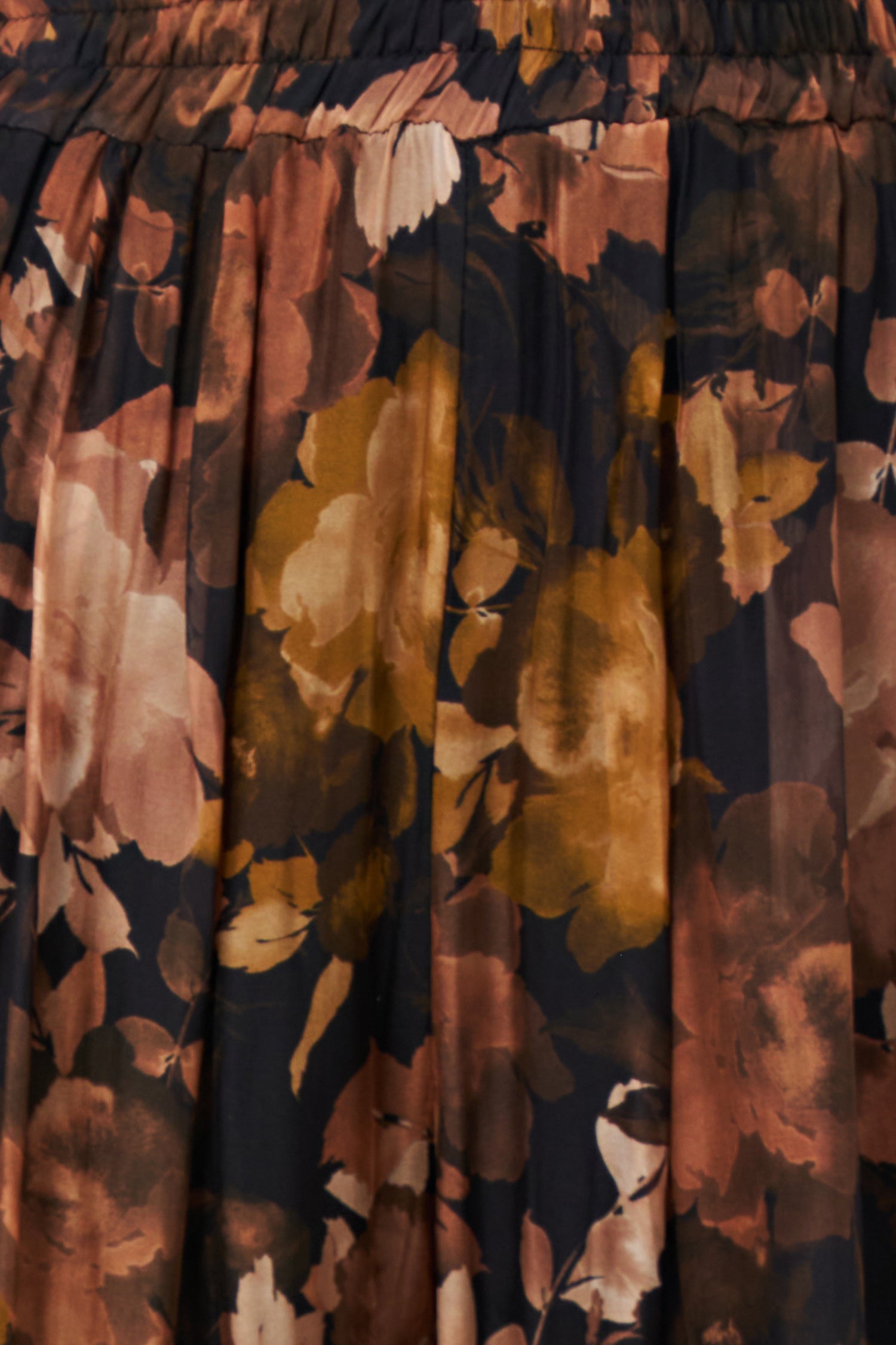 Sheer wide-leg pants in floral black Daphne print with flowy silk-viscose blend, ideal for garden parties or summer evenings.