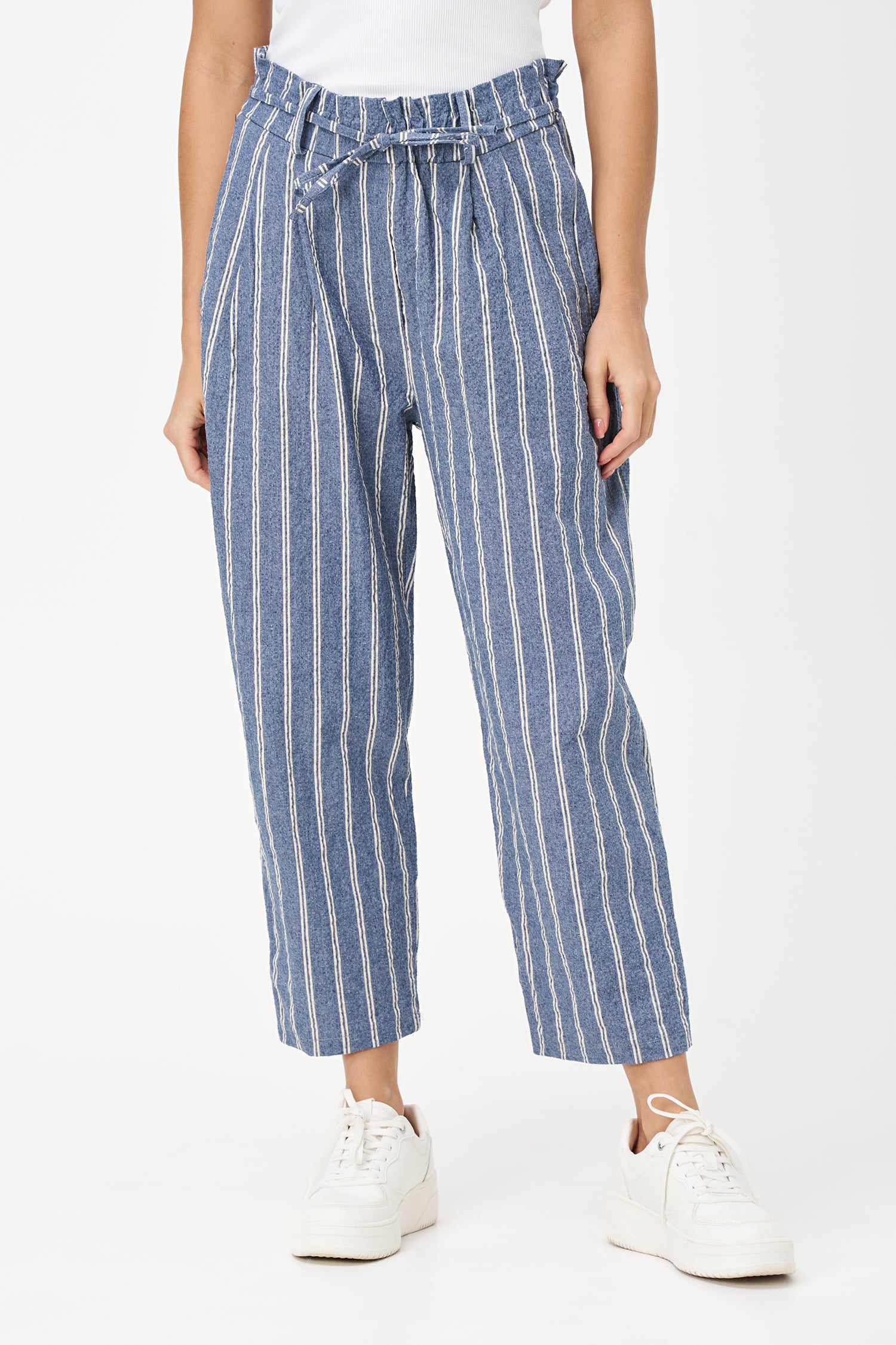 Blue striped cotton pants with tie-waist detail, cropped ankle length, and a tailored yet relaxed silhouette.