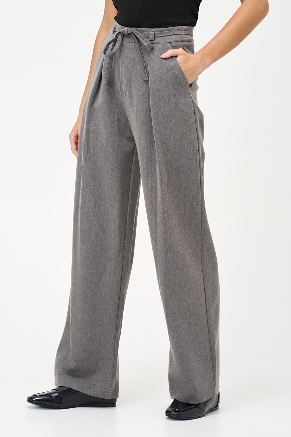 Gray tailored pants with pleated front and adjustable waist tie, crafted from a soft polyester-viscose blend.