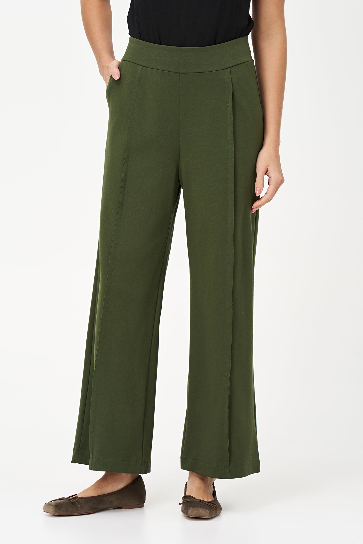 Bonsai flared pants with structured front seams and wide waistband, made from cotton-nylon stretch fabric.