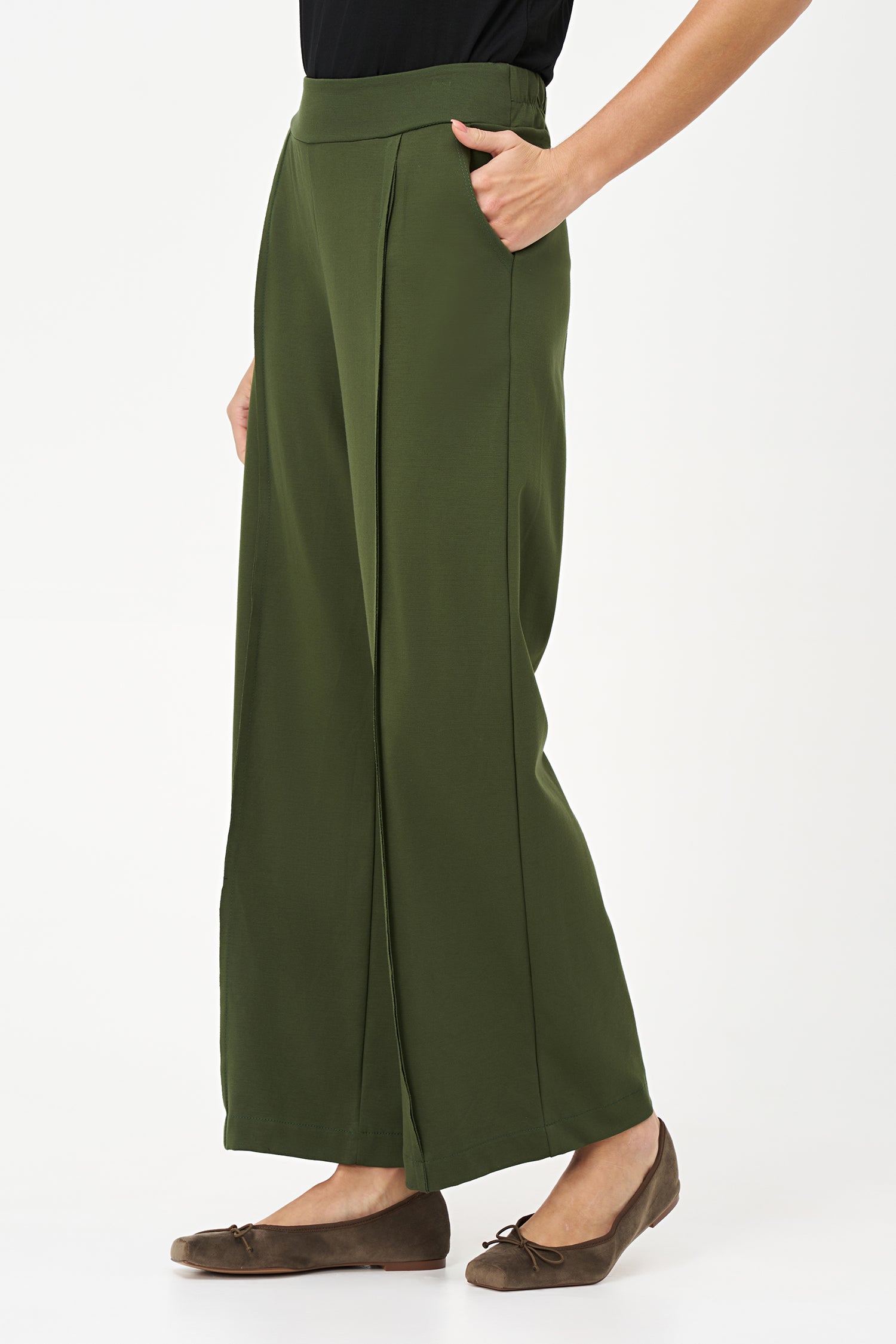 Bonsai flared pants with structured front seams and wide waistband, made from cotton-nylon stretch fabric.