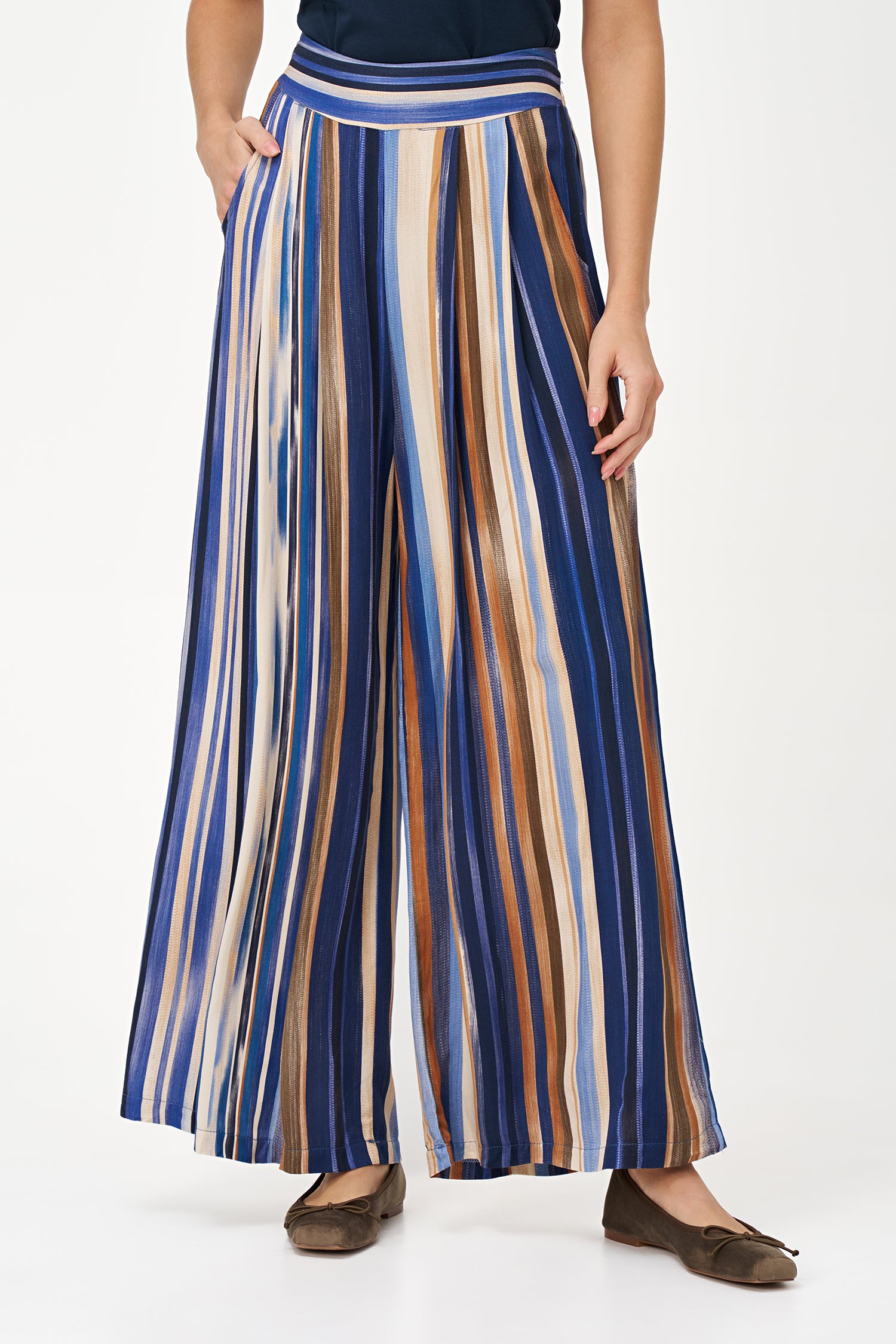 Colorful wide-leg pants in Blue Stripes print with an airy viscose drape, perfect for travel or warm-weather styling.
