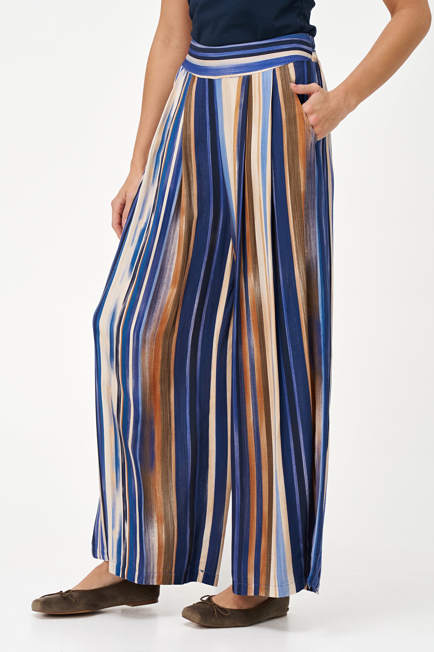 Colorful wide-leg pants in Blue Stripes print with an airy viscose drape, perfect for travel or warm-weather styling.