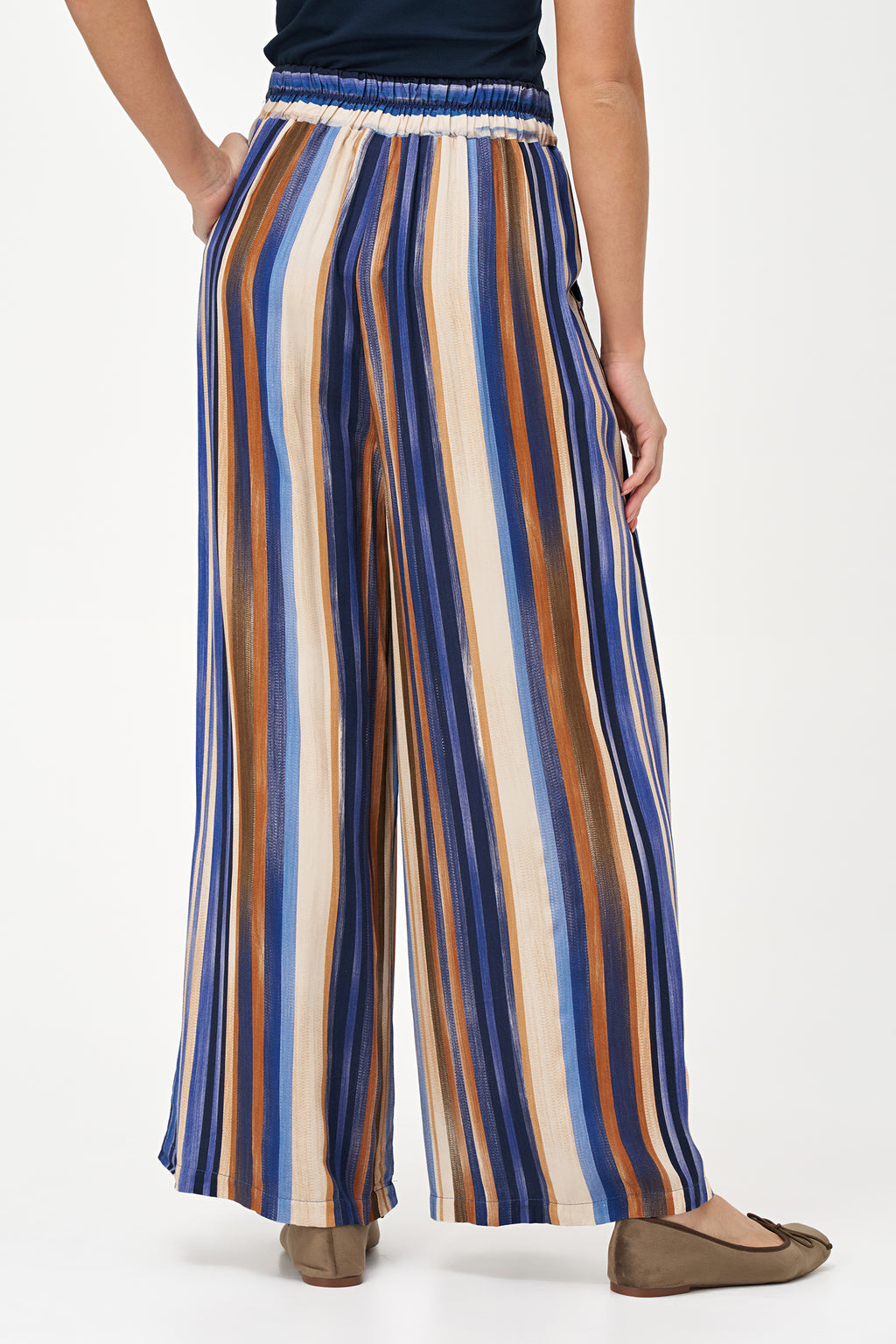 Colorful wide-leg pants in Blue Stripes print with an airy viscose drape, perfect for travel or warm-weather styling.