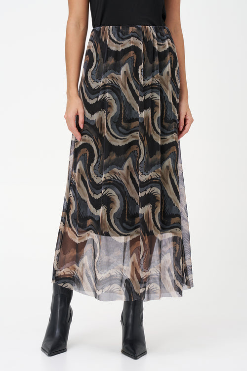 Flowy printed chiffon skirt in abstract Grey Erosion pattern with sheer hem, perfect for statement summer looks.