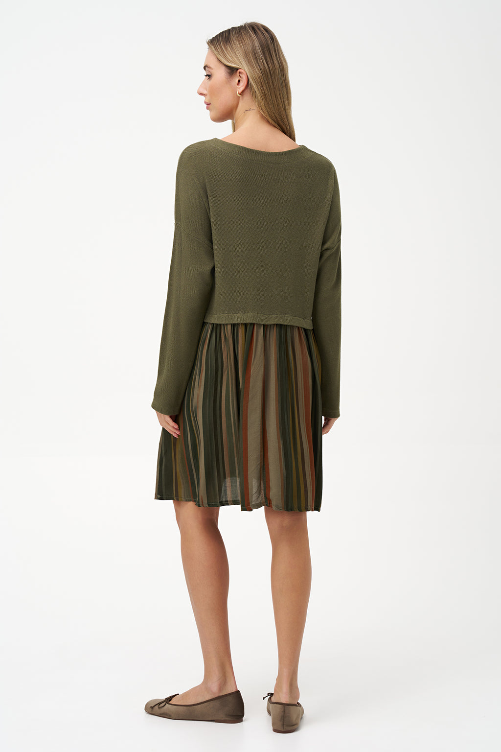 Two-tone long sleeve dress with solid olive knit top and striped flared skirt in earthy tones.