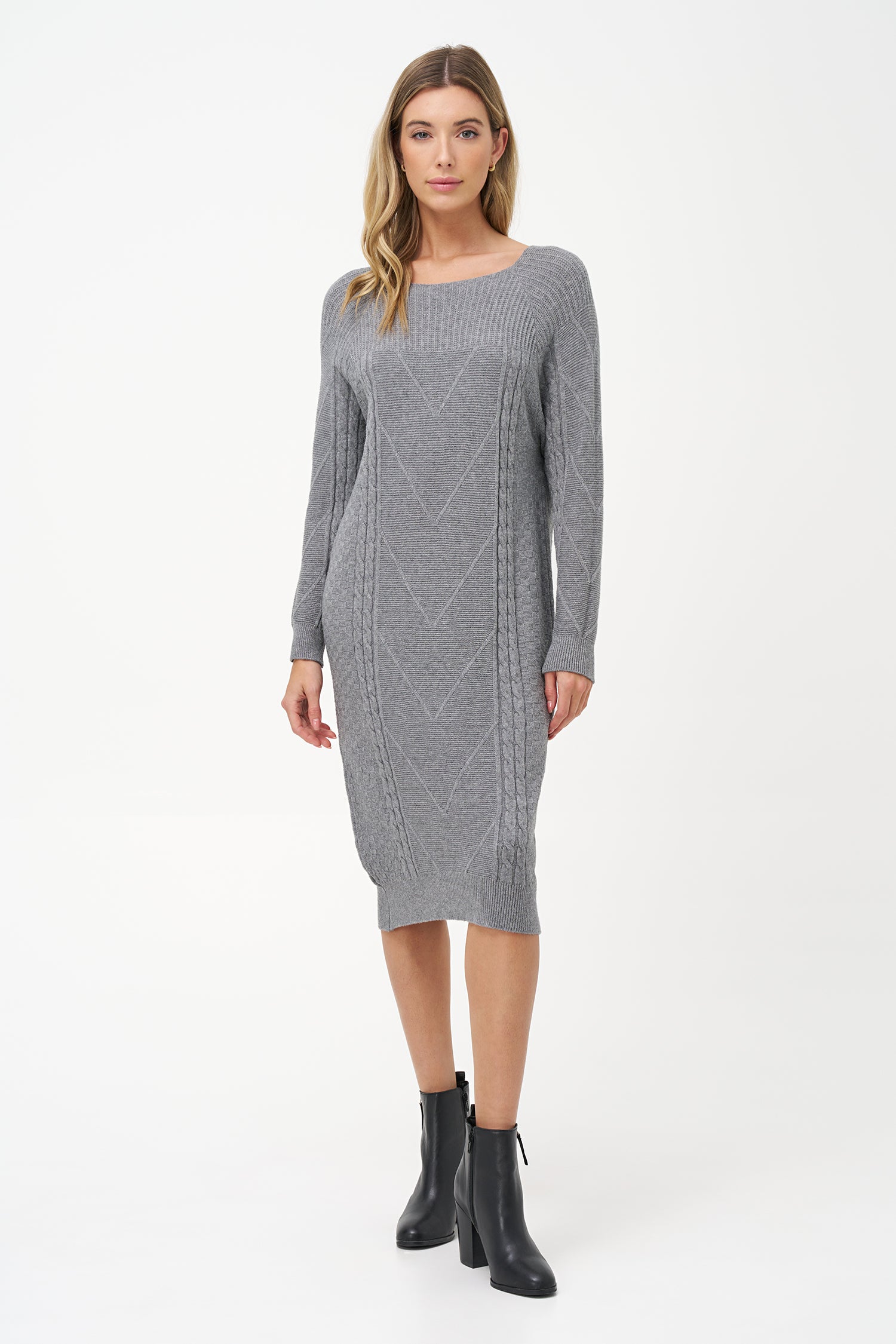 Grey cable knit sweater dress with long sleeves and ribbed hemline.