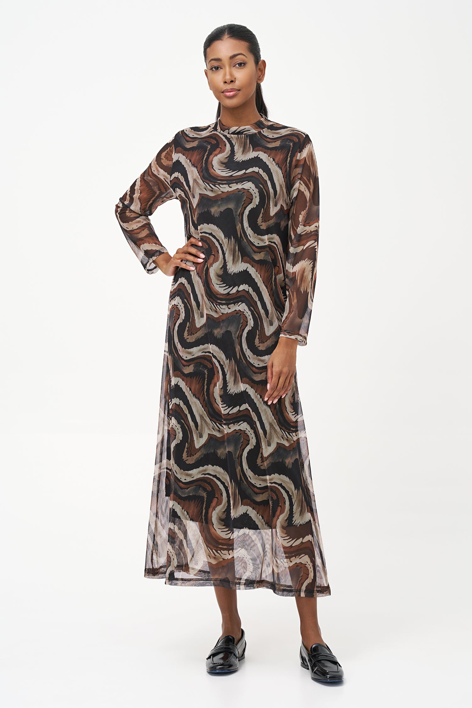 Long-sleeve midi dress in abstract brown swirl print with semi-sheer finish and straight silhouette.