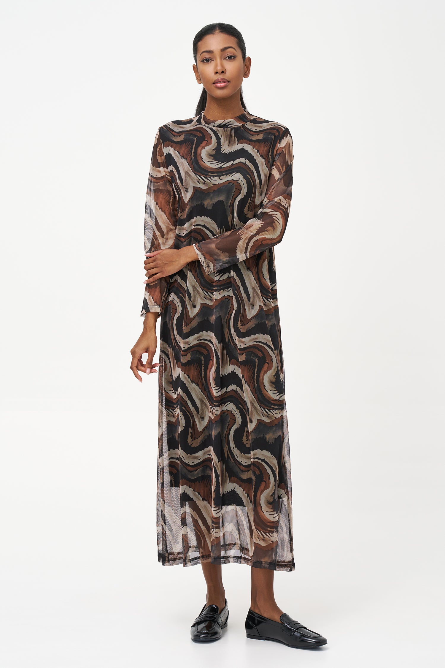 Long-sleeve midi dress in abstract brown swirl print with semi-sheer finish and straight silhouette.