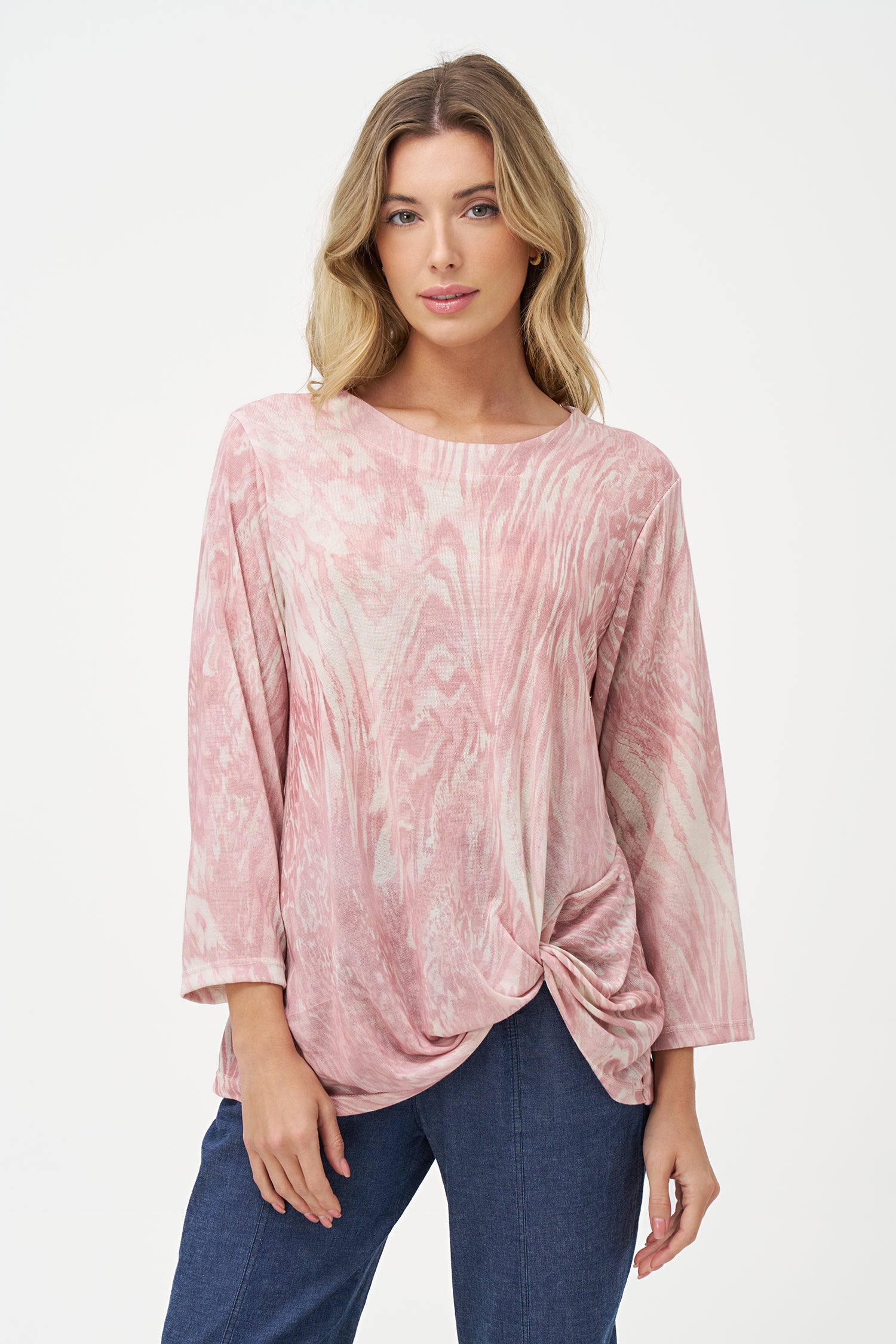Vanilla and white abstract print top with long sleeves and gathered twist detail at hem