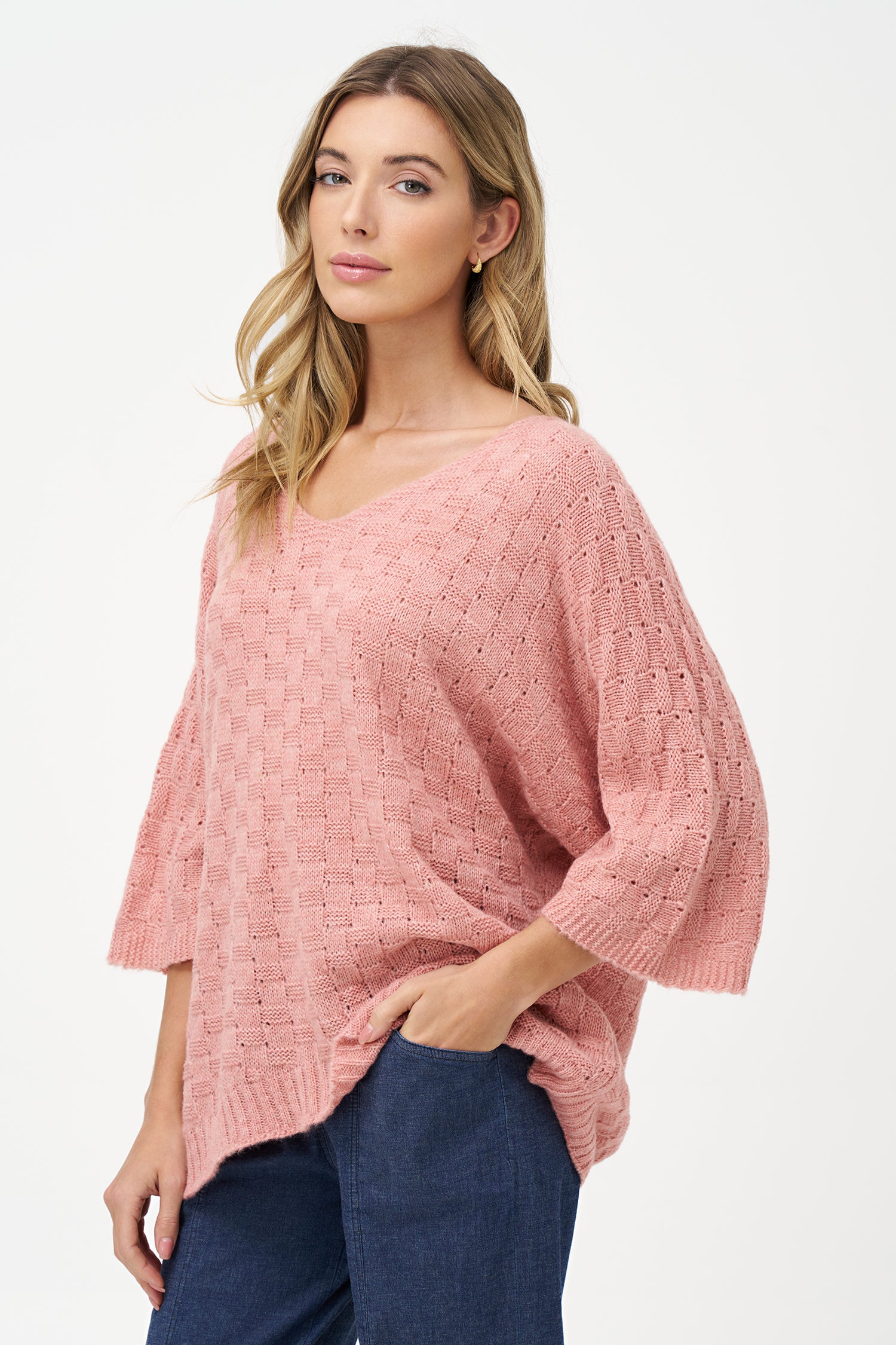 Beige knit women's sweater with V-neck and half sleeves, crafted from acrylic and wool blend for cozy, breathable texture.