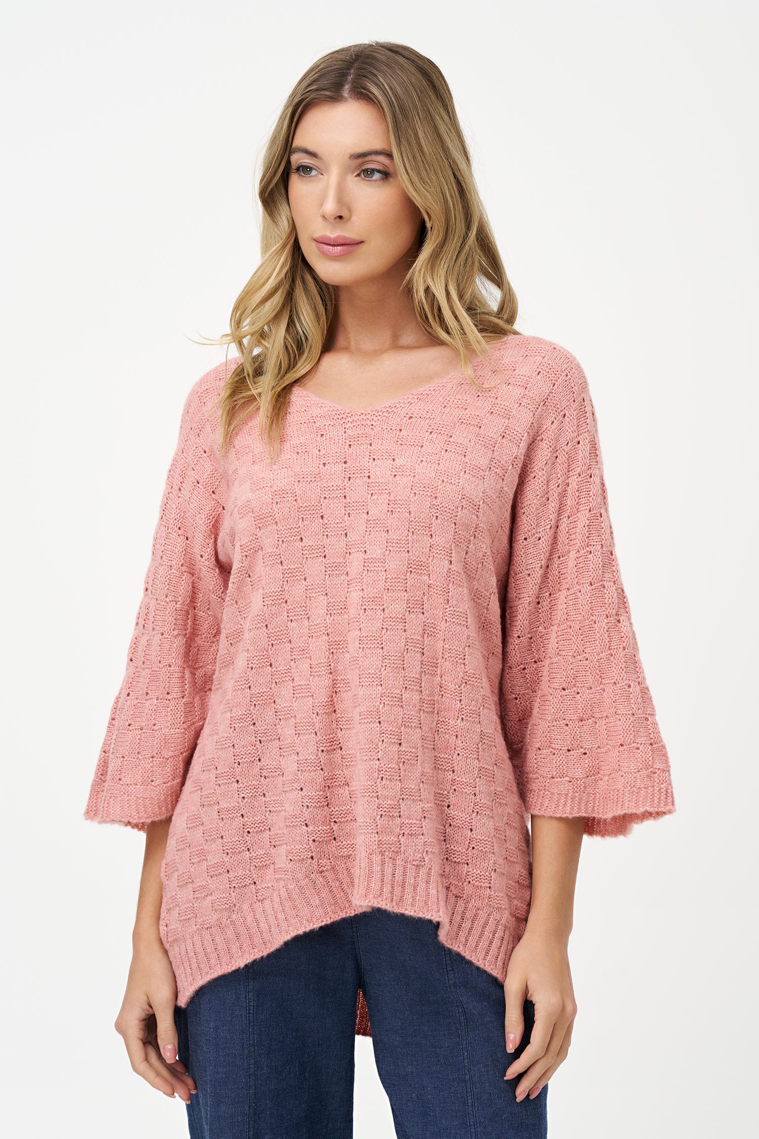 Beige knit women's sweater with V-neck and half sleeves, crafted from acrylic and wool blend for cozy, breathable texture.