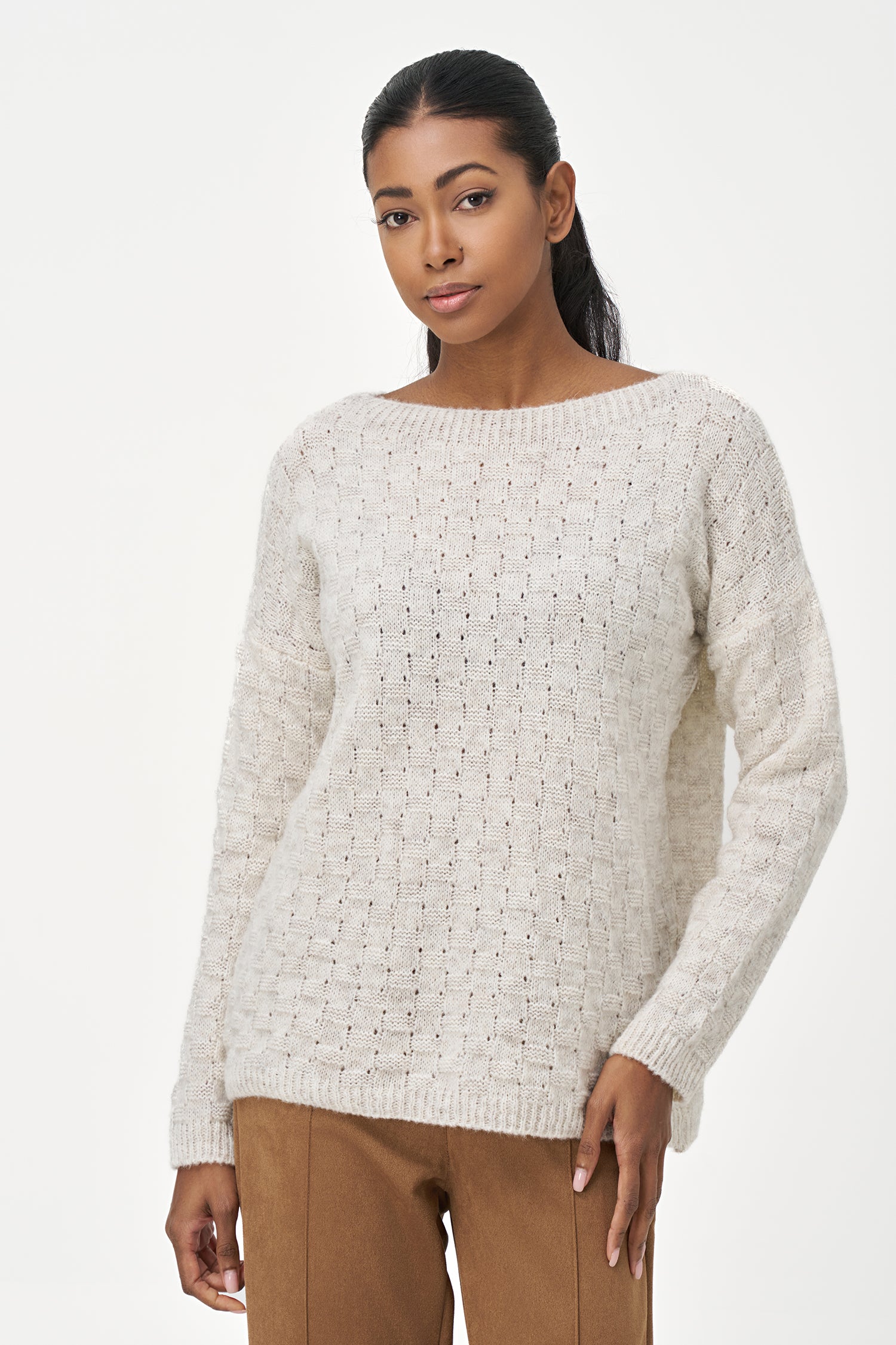 White long sleeve women's sweater with textured knit design, made from soft acrylic and wool blend for cozy everyday wear.
