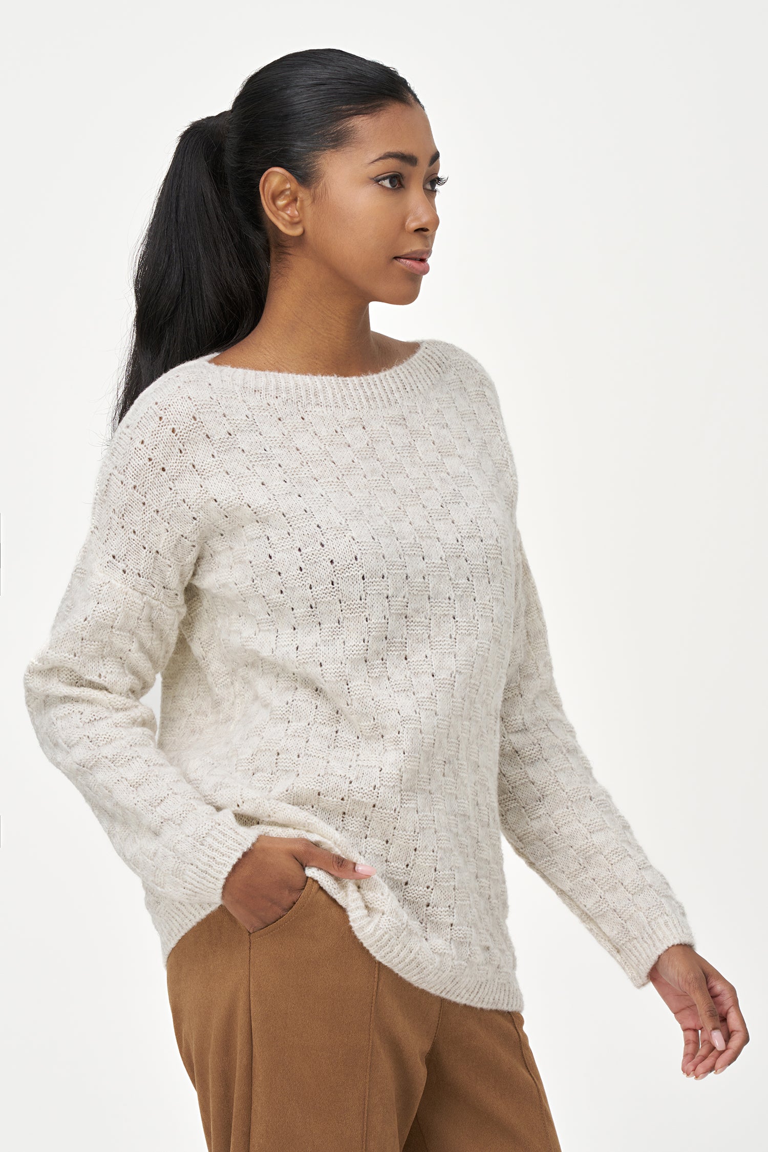 White long sleeve women's sweater with textured knit design, made from soft acrylic and wool blend for cozy everyday wear.