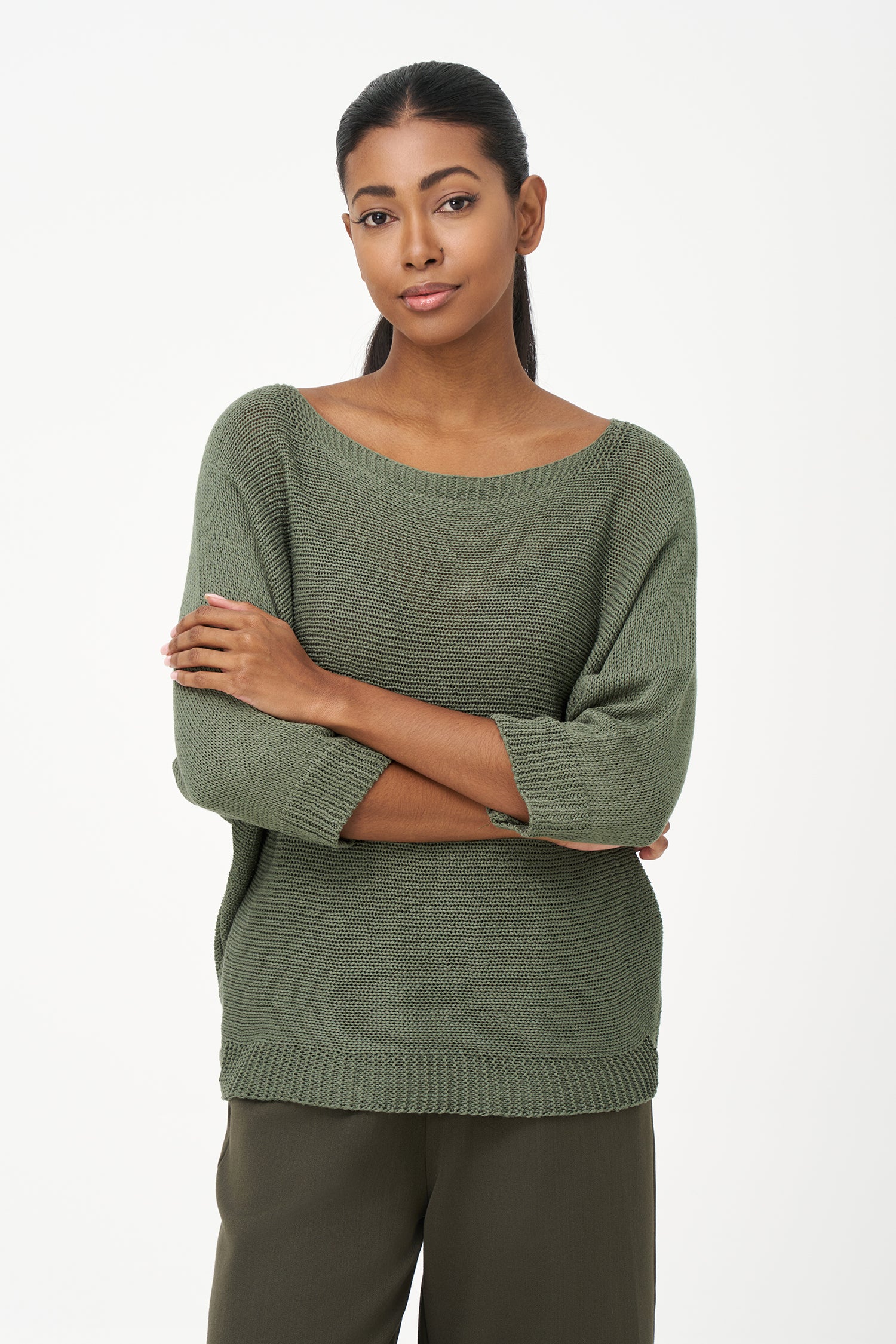 Brown ribbed acrylic sweater with soft knit texture and relaxed fit, perfect for cool days and layering in casual or dressy looks.