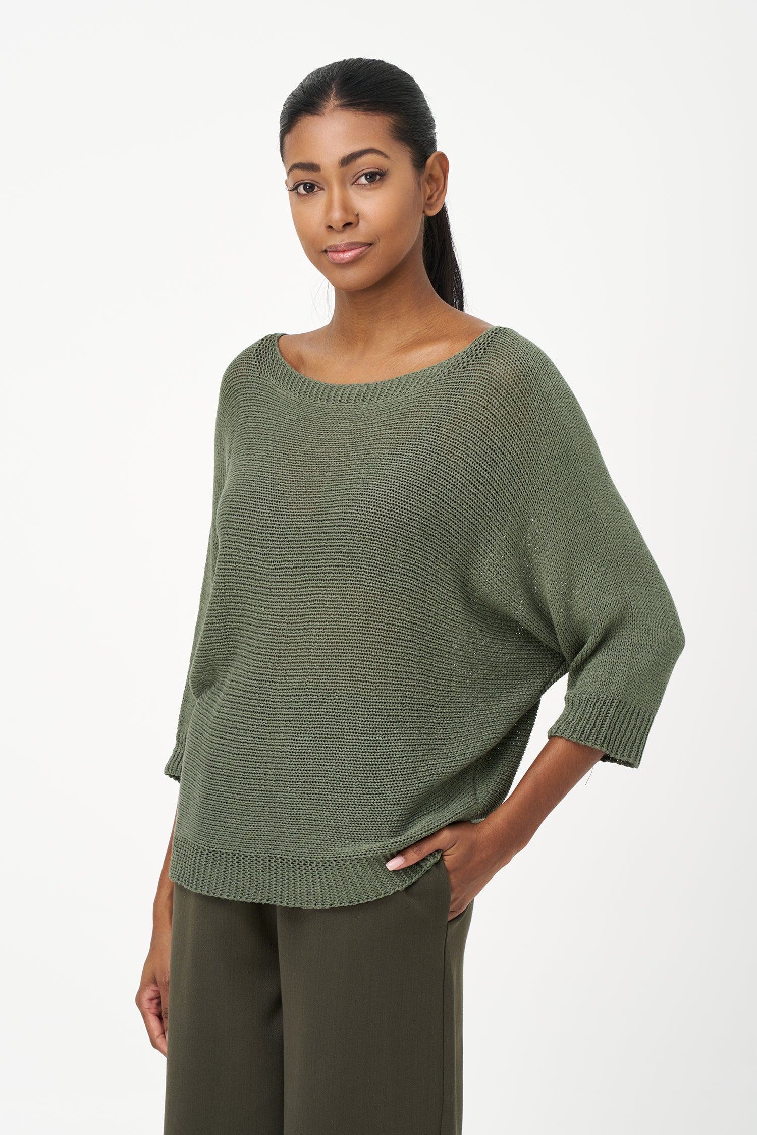 Brown ribbed acrylic sweater with soft knit texture and relaxed fit, perfect for cool days and layering in casual or dressy looks.