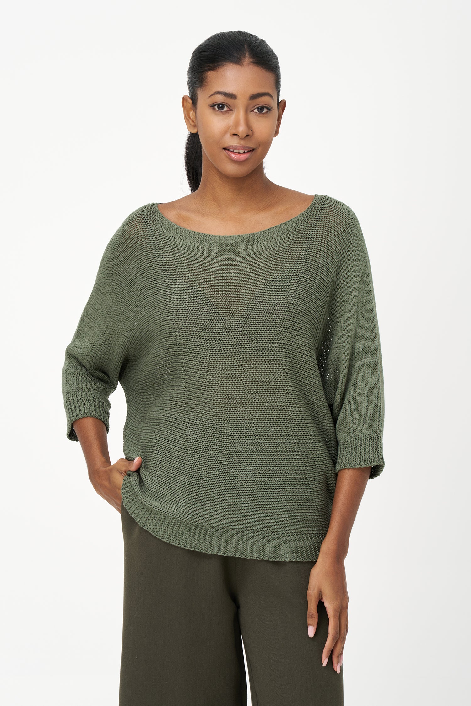 Brown ribbed acrylic sweater with soft knit texture and relaxed fit, perfect for cool days and layering in casual or dressy looks.