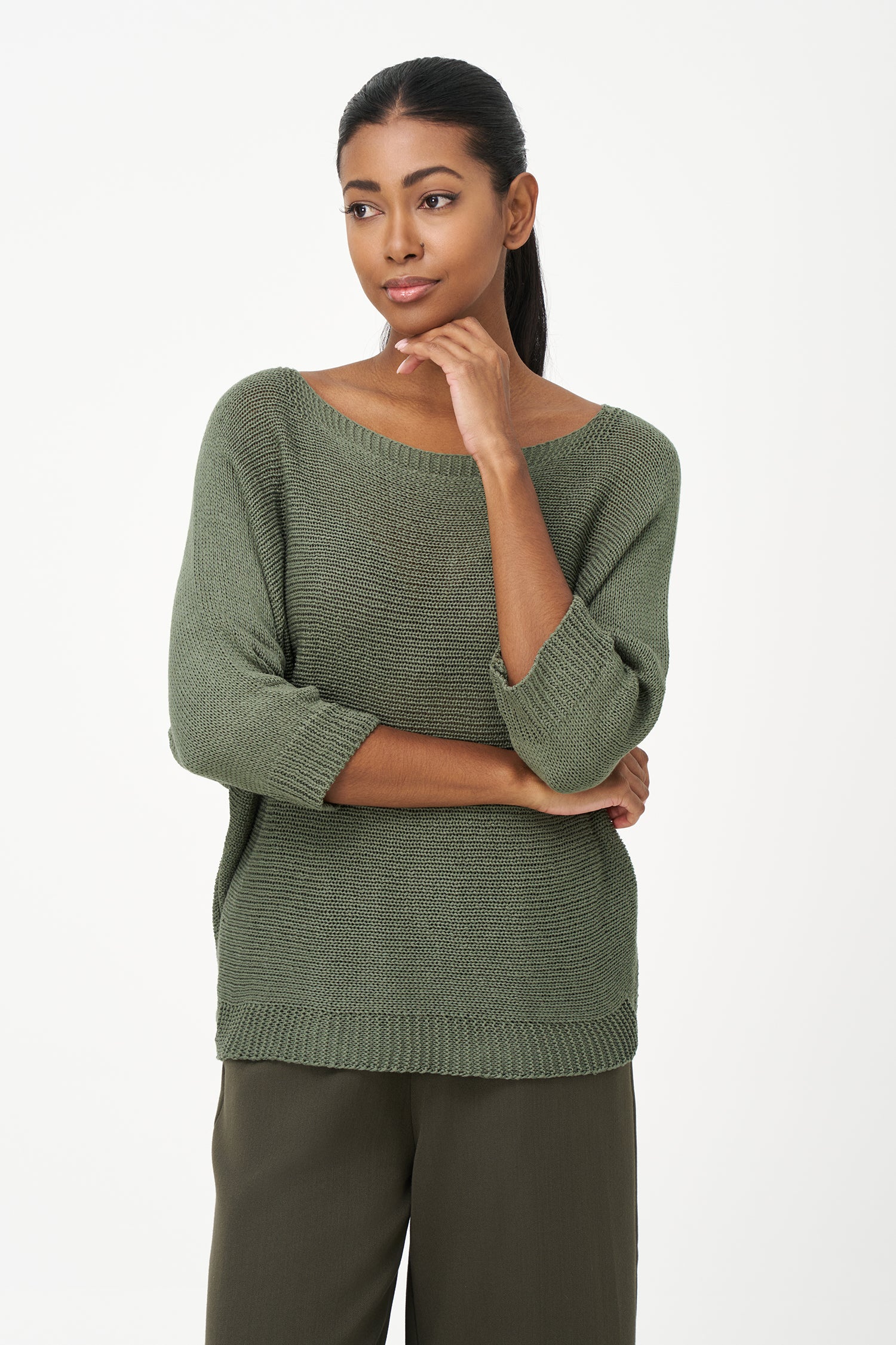 Brown ribbed acrylic sweater with soft knit texture and relaxed fit, perfect for cool days and layering in casual or dressy looks.