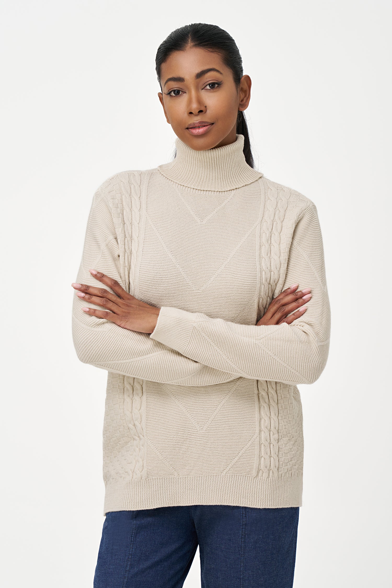 White turtleneck sweater with cable knit details and ribbed cuffs, crafted in a viscose blend for a cozy yet refined everyday look.