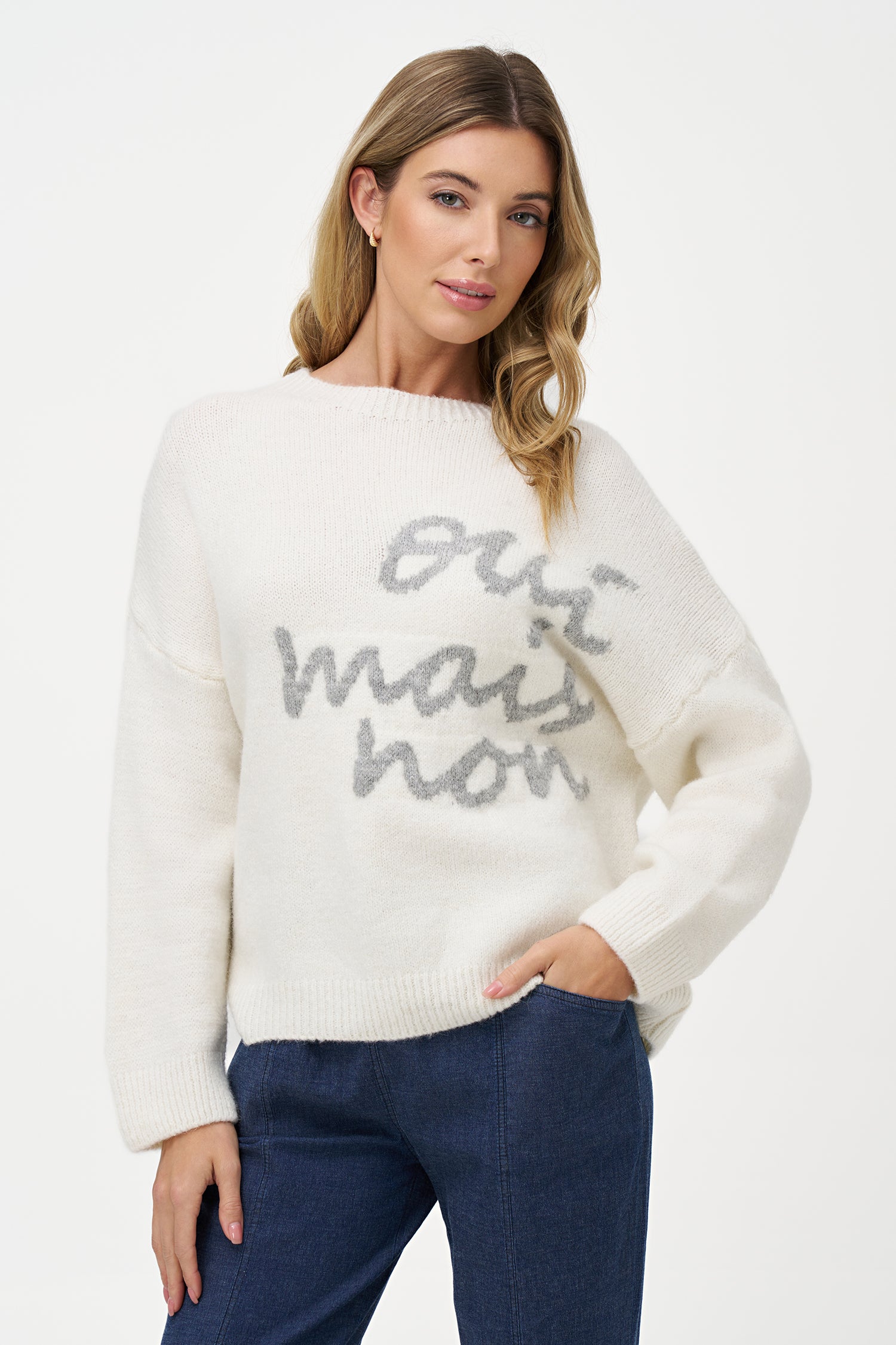 White Vanilla crewneck sweater with soft texture and red script design, ideal for casual outfits and everyday comfort.