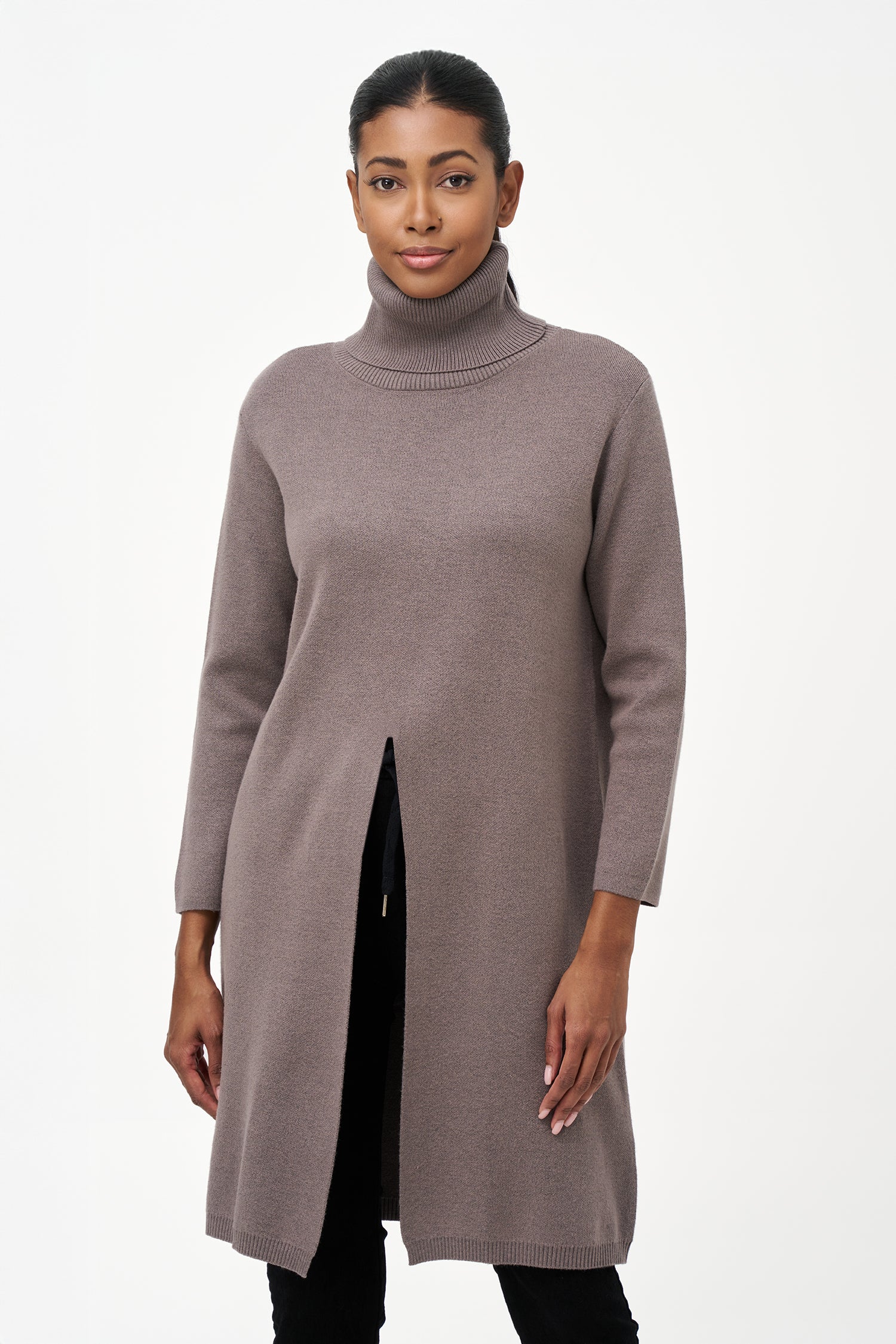 Long grey turtleneck knit tunic sweater with a clean front slit, tailored for comfort and layering with a modern, elegant silhouette.